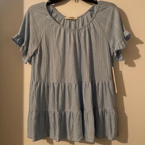 Above and Beyond Tiered Top NWT